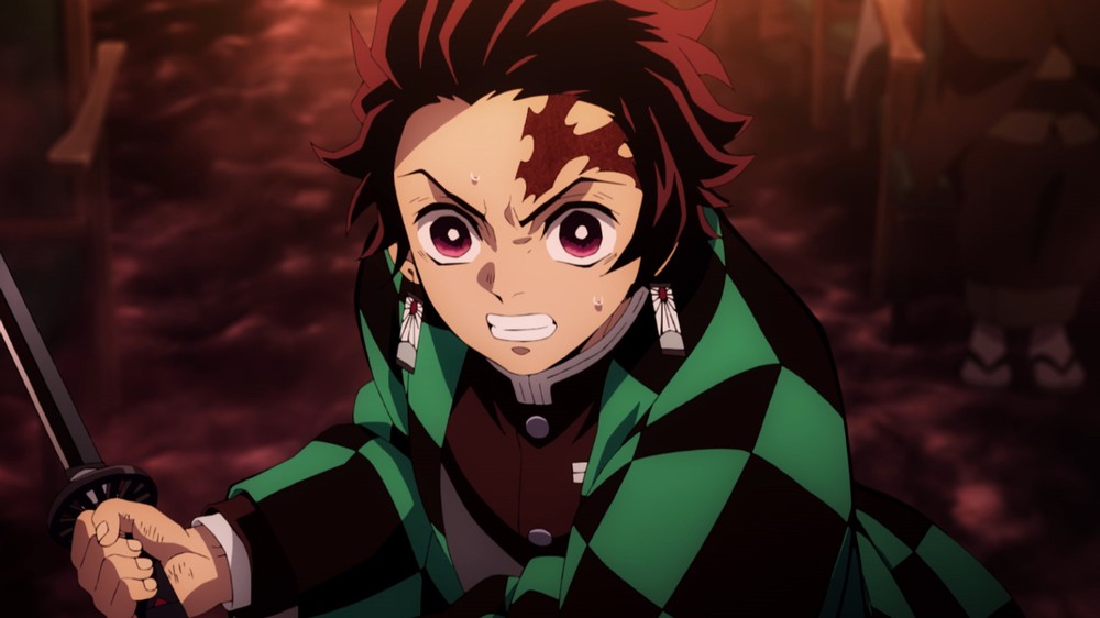 Tanjiro, protagonista de Demon Slayer, é um jovem guerreiro que busca salvar a irmã de uma maldição — Foto: Divulgação/Crunchyroll