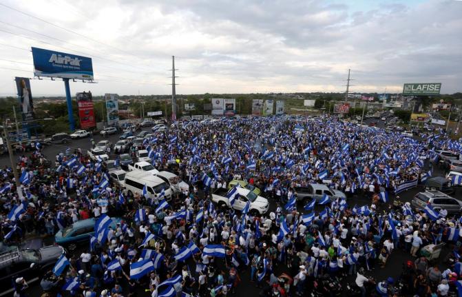 People protest at the Jean Paul Genie roundabout against the government of President Daniel Ortega, in Managua, Nicaragua, on May 15, 2018.