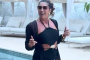 Mãe de Virginia sensualiza e mostra tatuagem íntima: "Brindar à vida"